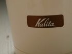 画像: Kalita カリタ 電動コーヒーミル KM-45　Y-301A　45g/20秒急速粉砕ファミリータイプ　ボディー：ホワイト 蓋：半透明オレンジ