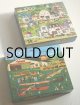 画像: MB PUZZLE CHARLES WYSOCKI'S AMERICANA 1000 Piece Puzzle　MBパズル　1000ピースパズル チャールズ・ワイソッキーシリーズ”アメリカーナ”　1.  ”Four Aces Flying School” (1987) 　フォー・エース・フライング・スクール　2. "ANTIQUES, Country FUNITURE, BAKE SHOP, BOOKS LIBRARY, PIPSHOP, BOOTERY, FORGE, CHEMIST " (1986) アンティークーショップなど 